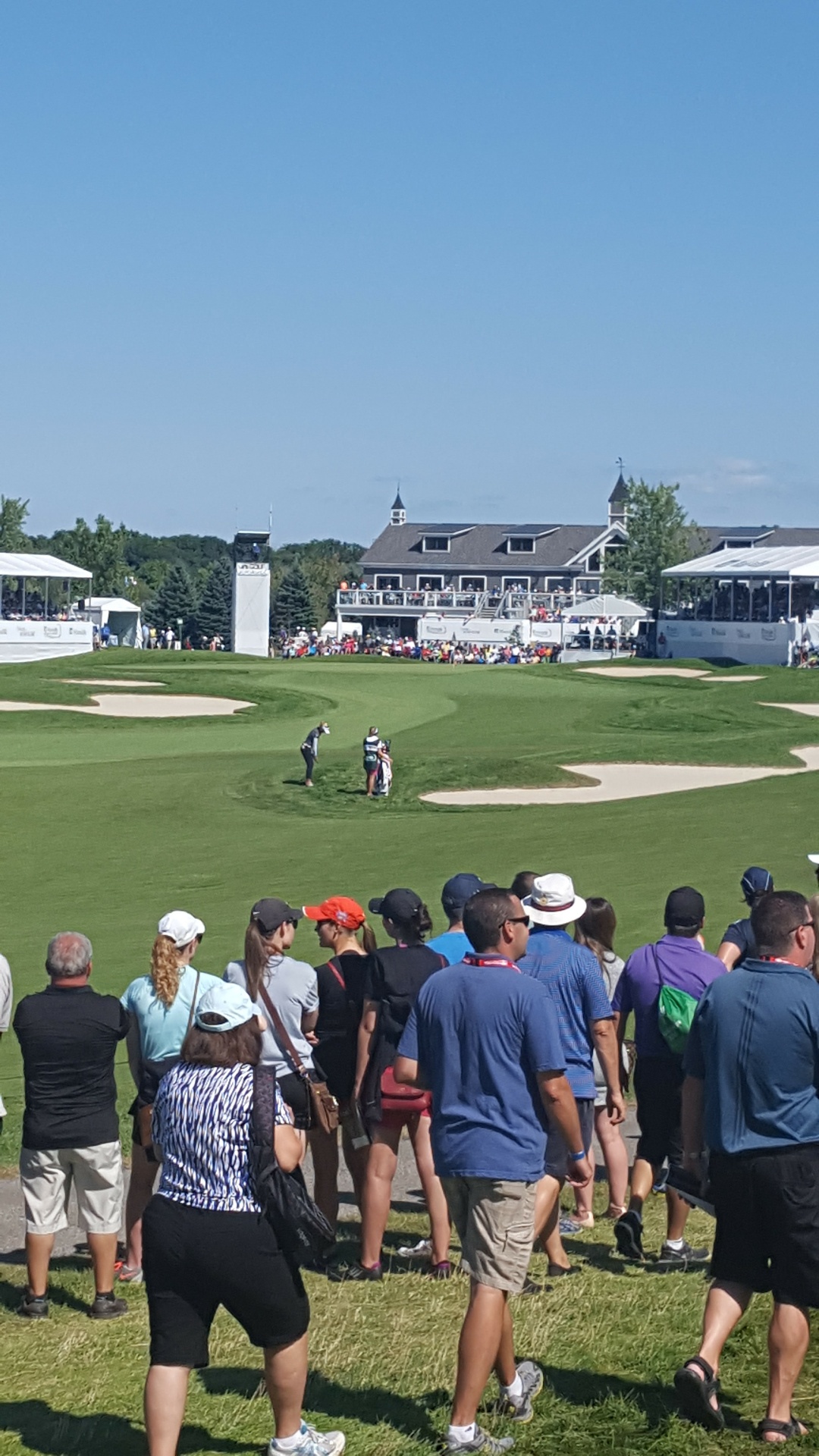 Tournament crowd around the 18th green